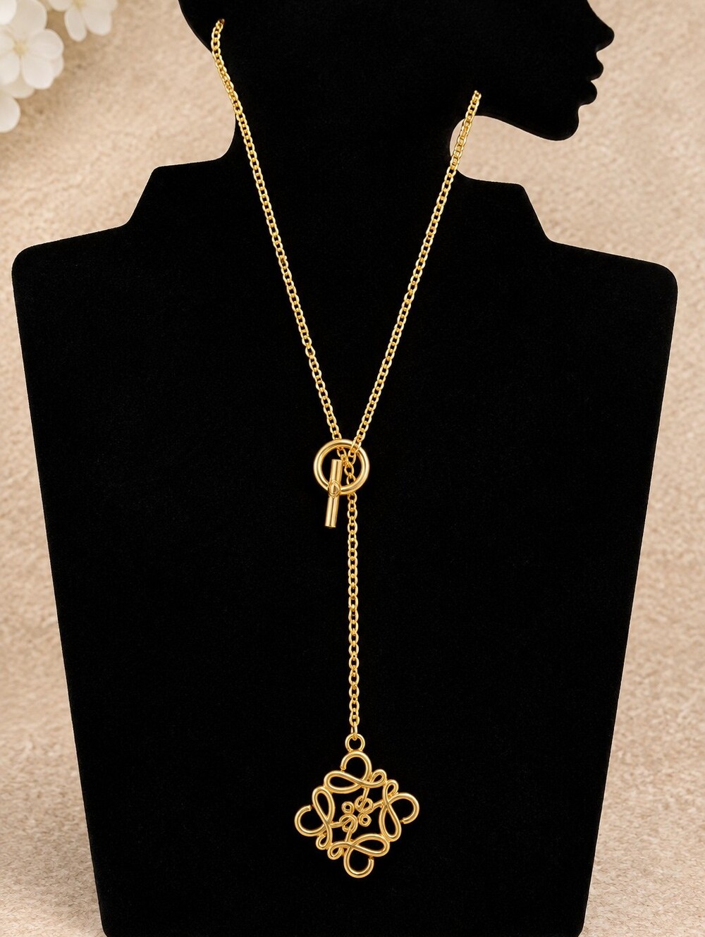 LOEWE 18kgp Loewe Gold-Tone Women's Lariat Necklace with Filigree Pendant